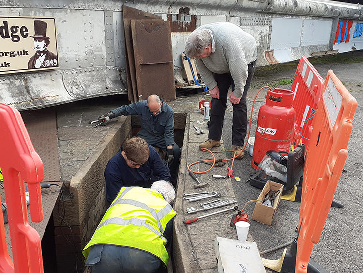 Geoff, Charlie and Julian working on the Hydrailic Jigger